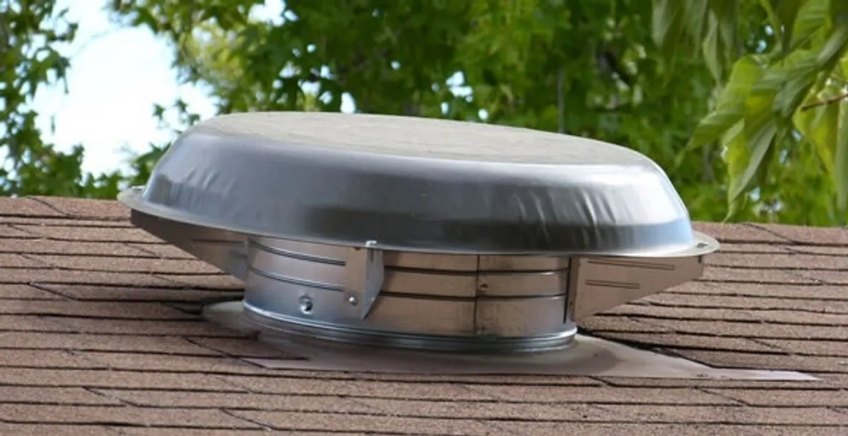 attic fan installation services with low-profile roof ventilation unit in Long Beach, CA