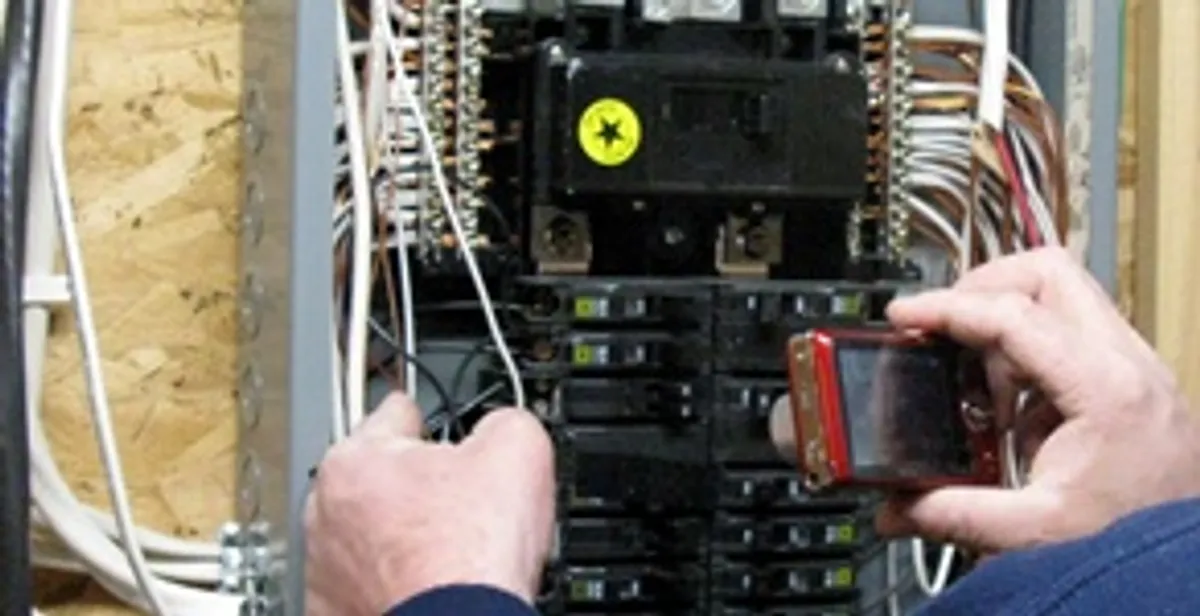 Home electrical inspection of circuit breaker panel by licensed electrician in Long Beach, CA